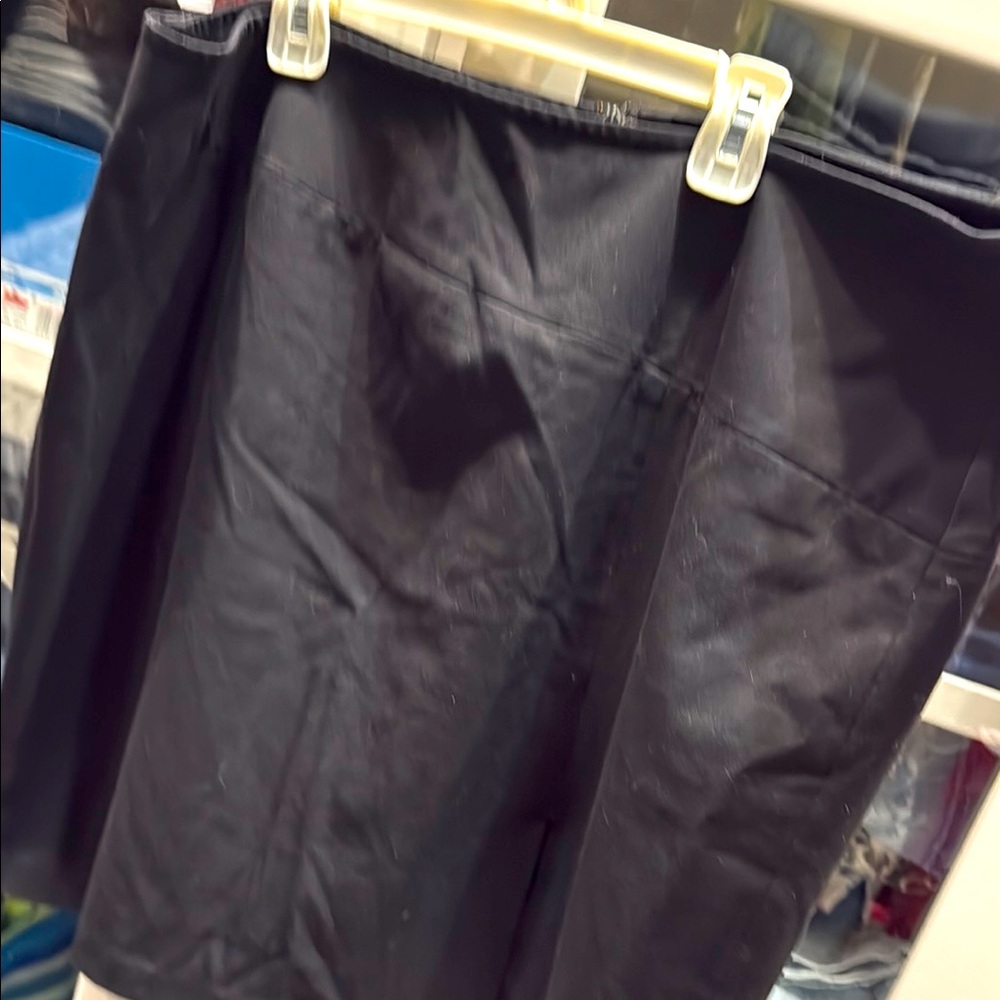 Black skirt - back invisible zipper with hook & eye; front kickpleat